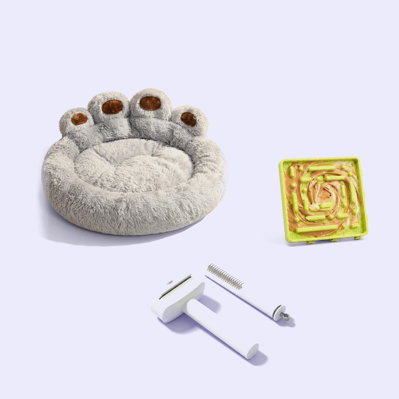 The paw bed, the green lick mat, and the brush with its comb